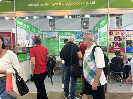 Visitors exploring private label supplement products at the MINGYAN exhibition booth